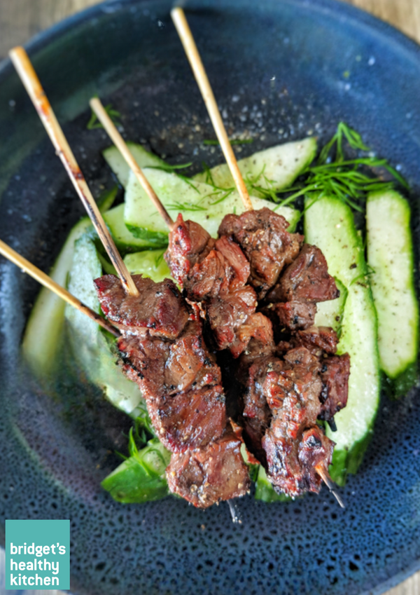 Barbecued Sticky Beef Skewers on a Cucumber Salad